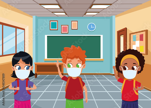 interracial kids using face masks for covid19 in the classroom