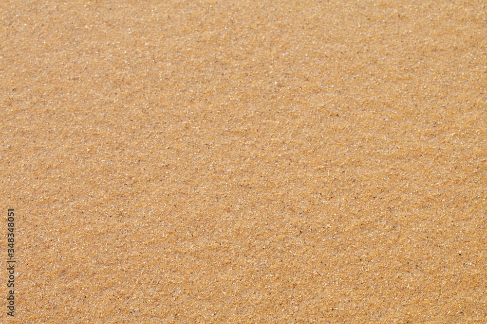 Textured wet sand beach background Textured wet sand beach background