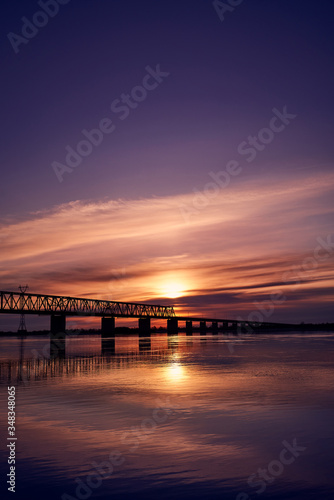 Sunset over bridge through Zeya river © Mikhail Mishchenko