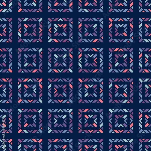 Vector geometric ornamental seamless pattern. Abstract texture with colorful particles on dark blue background, squares, triangles, diamonds, grid. Ethnic folk motif ornament. Repeat decorative design