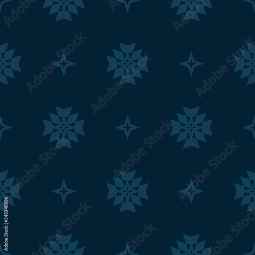 Subtle vector floral minimalist seamless pattern. Simple abstract background with small geometric flowers, stars, crosses. Minimal ornament texture in dark blue color. Stylish modern repeat design