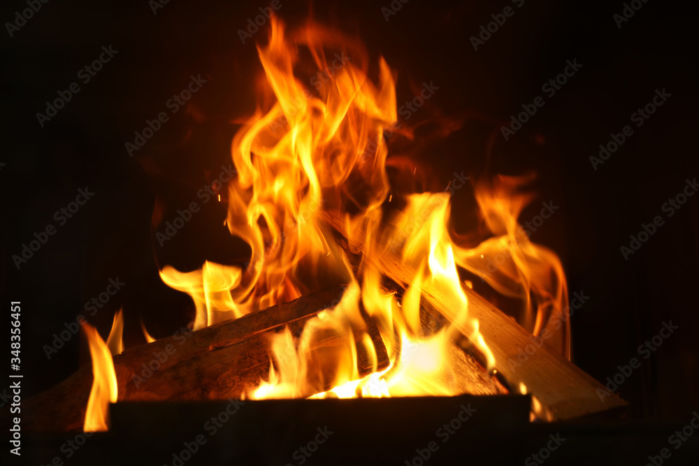 Fireplace with burning wood, closeup view. Winter vacation Fireplace with burning wood, closeup view. Winter vacation