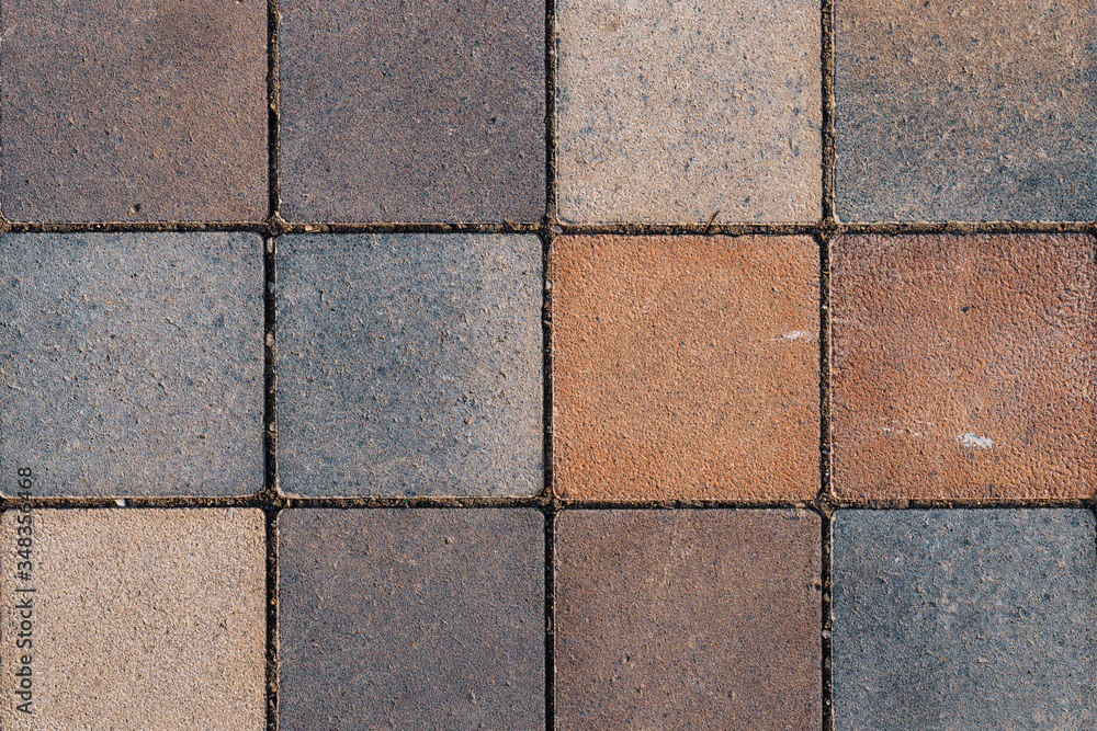 Rustic floor covered with square terracotta tiles Rustic floor covered with square terracotta tiles