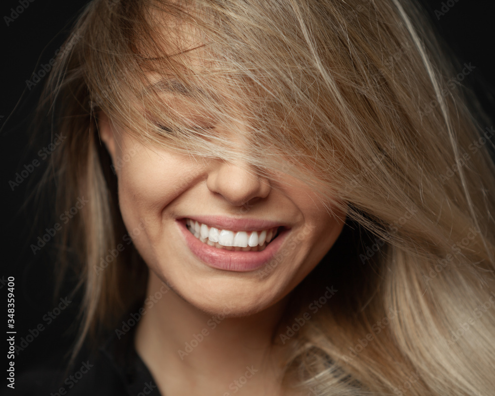 Beautiful young blonde girl with a lovely natural smile. Beautiful young blonde girl with a lovely natural smile.