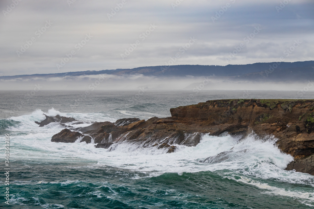 Waves breaking on the California coastline