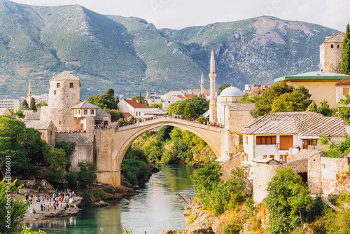 Old Bridge Mosque and Neretva river in the Old Town of Mostar, Bosnia