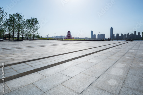 Empty floor and modern building with sunbeam 