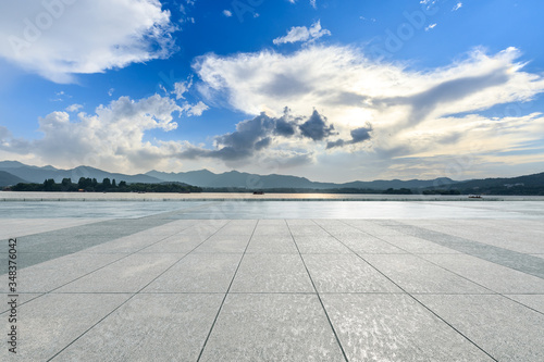 Empty square floor and mountain landscape in hangzhou. © ABCDstock