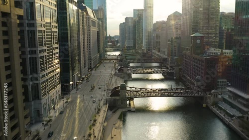 Cars Drive on Upper Wacker Drive along Chicago River during COVID-19 Stay at Home Order, Push In photo