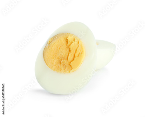 Halves of fresh hard boiled chicken egg isolated on white