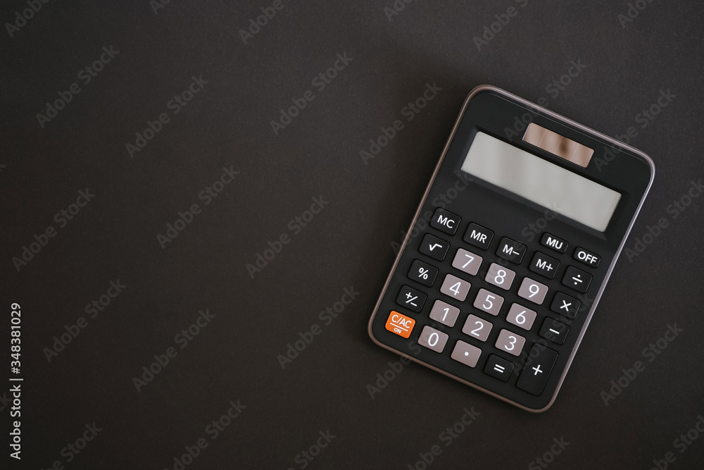 Сalculator on the black background. Сalculator on the black background.