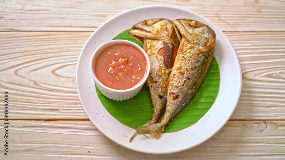 Fried mackerel fish with spicy shrimp paste sauce - Thai food style Fried mackerel fish with spicy shrimp paste sauce - Thai food style