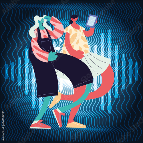 women listening music and dancing