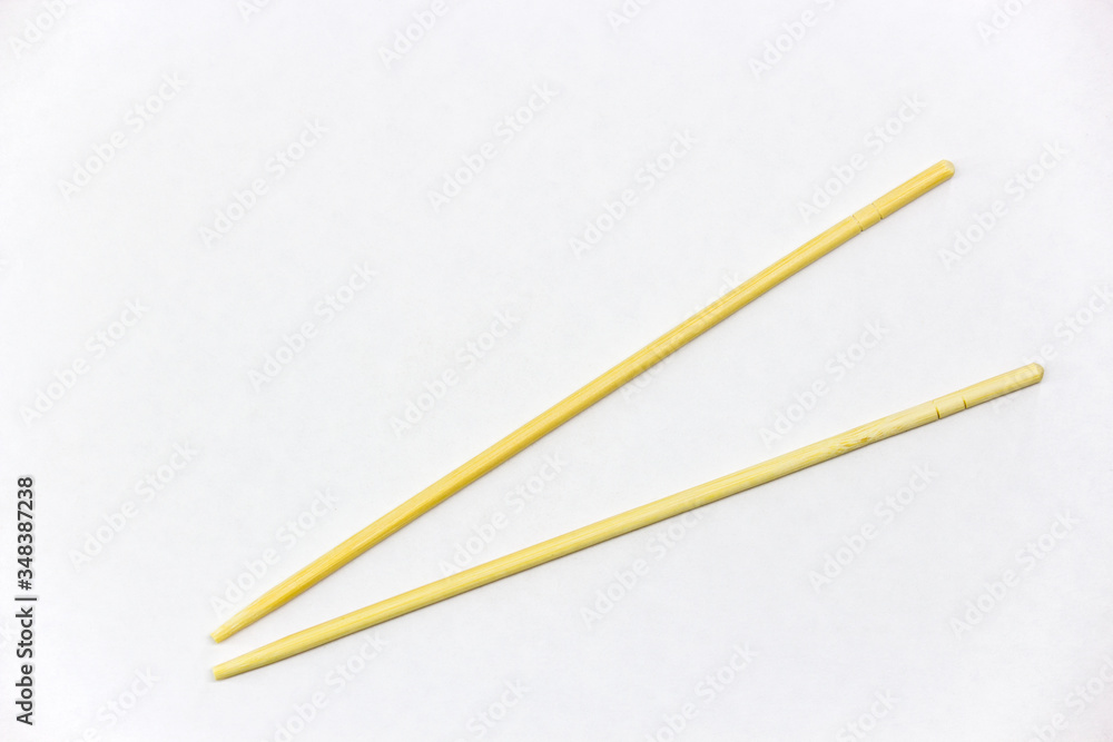 Wooden chopsticks, isolated on white background copy space Wooden chopsticks, isolated on white background copy space