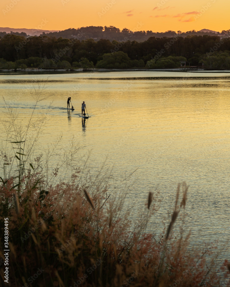 Paddling as the sun sets over Currumbin River