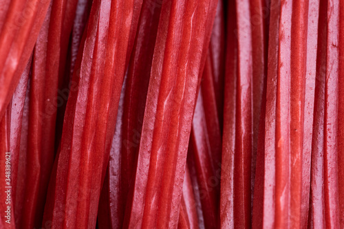 detail of many red licorices together photo