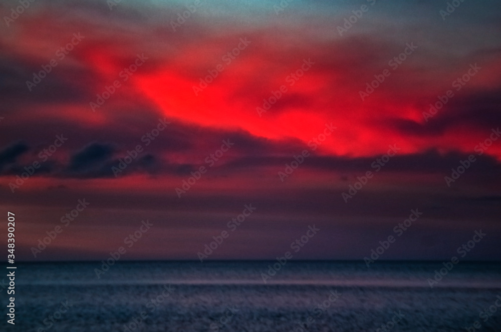 sunset over the sea, sky, ocean, clouds, water, beach, summer, dramatic, red, beautiful, coast, blue, intense, seascape