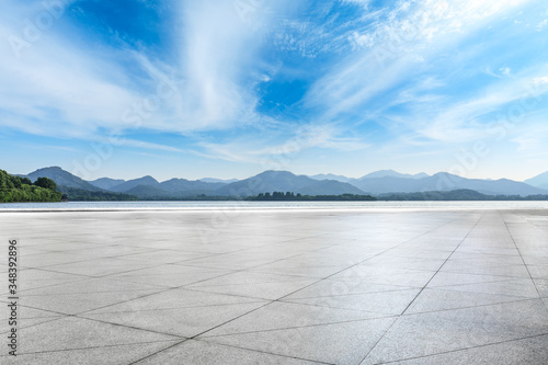 Empty square floor and mountain landscape in hangzhou. © ABCDstock
