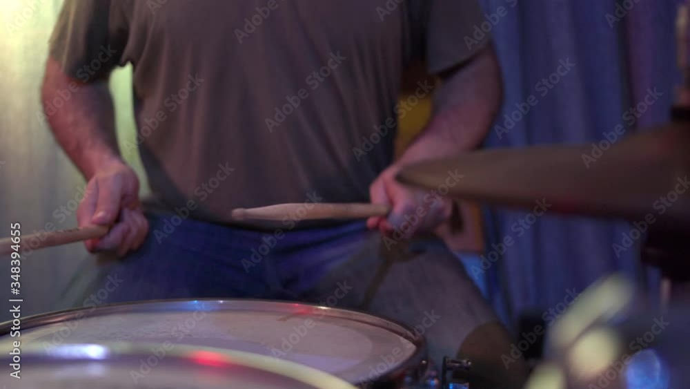 Close-up of a man playing the drums Close-up of a man playing the drums