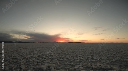 Bolivian Salt Flats Timelapse Sunset over mountains photo