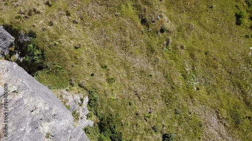 drone shot flying through two peaks and look down dangerous.mov photo