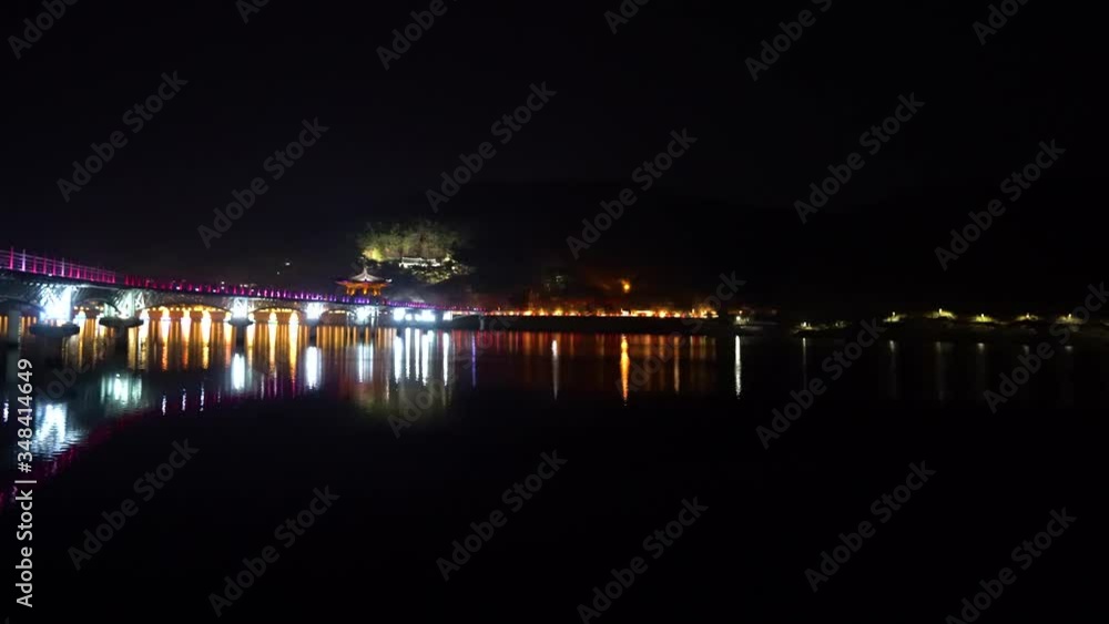 Night view of Andong river and Wolyeonggyo bridge in Andong city, South Korea. Night view of Andong river and Wolyeonggyo bridge in Andong city, South Korea.