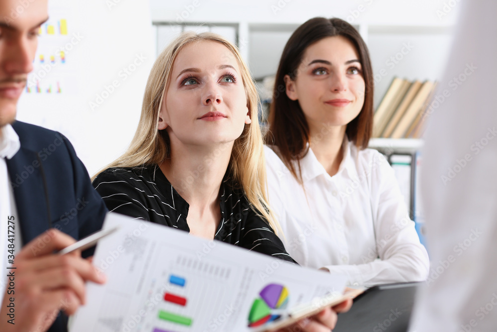 Group of people hold silver pen ready to make Group of people hold silver pen ready to make