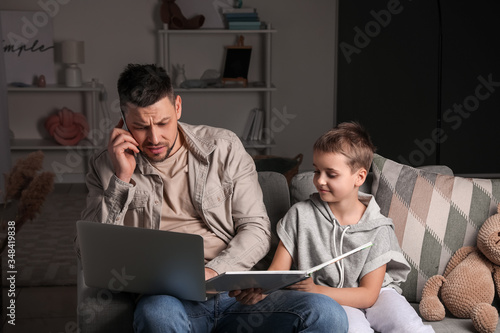 Working father with little ...