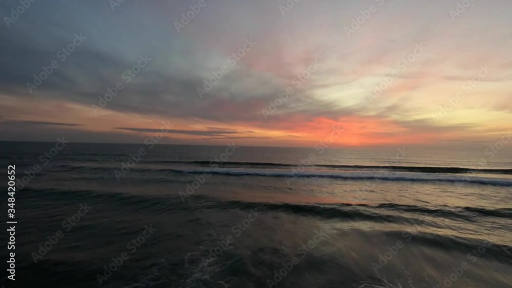 Awesome sunrise over ocean waves crashing. Awesome sunrise over ocean waves crashing.