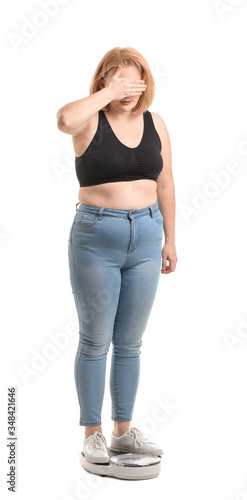 Troubled overweight woman w...