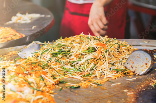 Blurred images of Pad Thai menu,Pad Thai is a ready-to-eat food that is popular on the Walking Street or Street Food in Thailand because Pad Thai is easy to carry and easy to eat when walking.