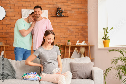 Pregnant woman with money a...