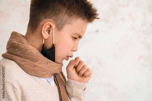 Ill coughing little boy on ...