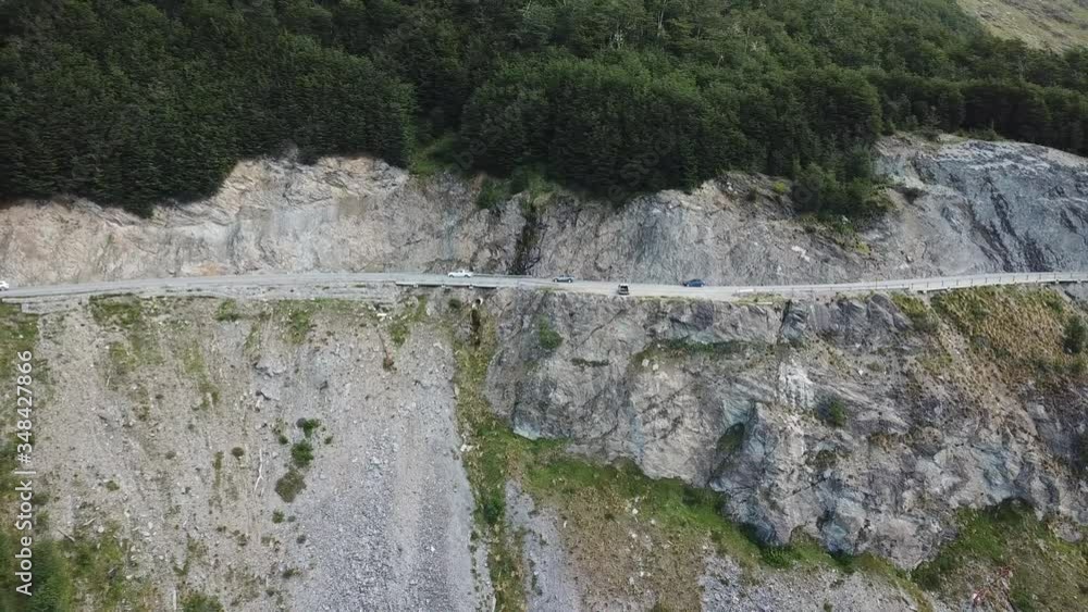 Pull Back Aerial View of Hillside Road In Tierra Del Fuego, Argentina