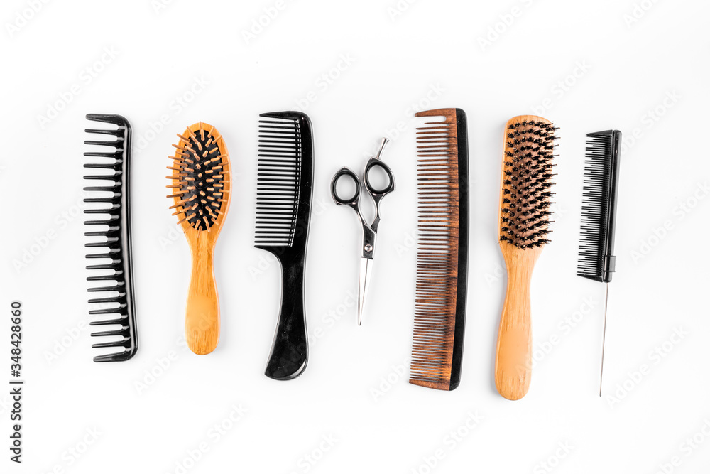 Hairdresser tools. Flat lay on white background top view Hairdresser tools. Flat lay on white background top view