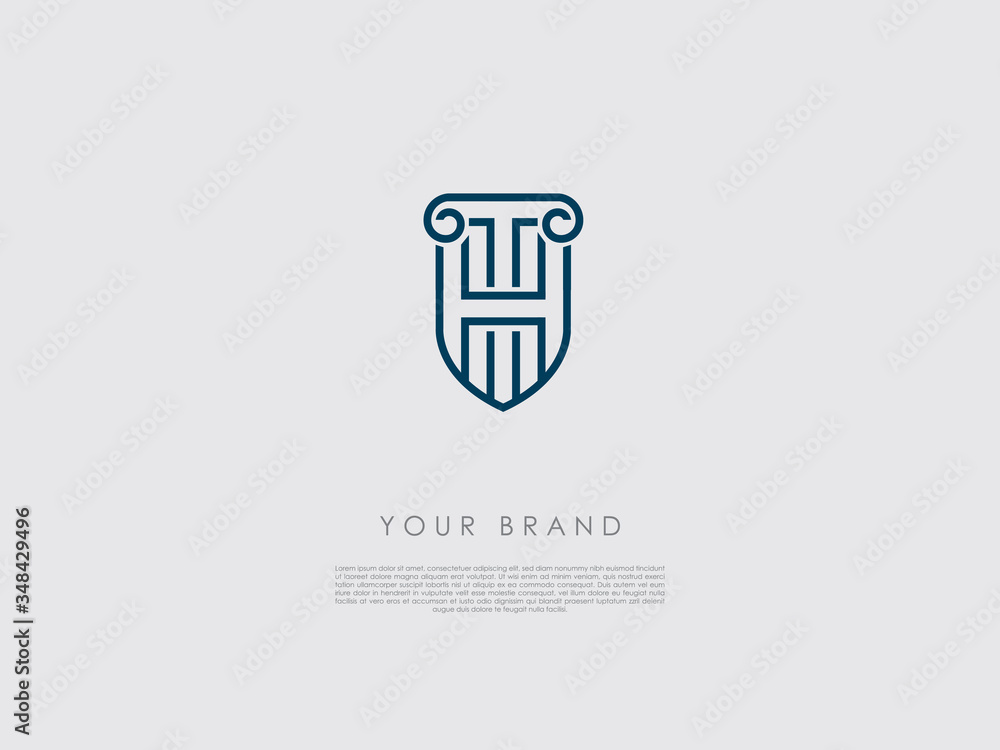 a blue business logo that looks like a shield and has representations of an ancient column, letter h and t a blue business logo that looks like a shield and has representations of an ancient column, letter h and t