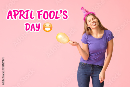 Funny woman in party hat an...