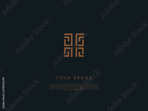 a rectangular business logo which has straight and 'L' shaped lines and letter 'I' in the middle 