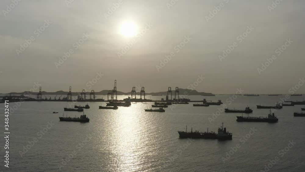 energy export and import business for transportation trade. aerial top view of the ship carrying the lpg and oil tanker in the sea port with vessel global logistics at sunset. energy export and import business for transportation trade. aerial top view of the ship carrying the lpg and oil tanker in the sea port with vessel global logistics at sunset.