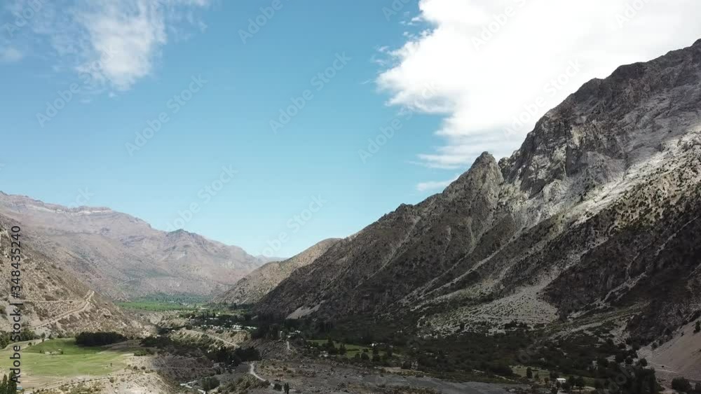 Aerial View of Green Valley Under Andes Mountain and Summer Sky, Landscape of Chile Aerial View of Green Valley Under Andes Mountain and Summer Sky, Landscape of Chile