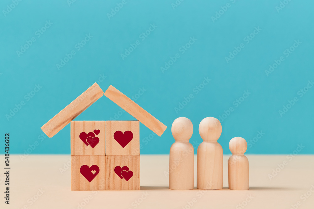 Online dating. Virtual love. Creating family. Love relationship. House of wooden cubes with heart signs, family members Online dating. Virtual love. Creating family. Love relationship. House of wooden cubes with heart signs, family members