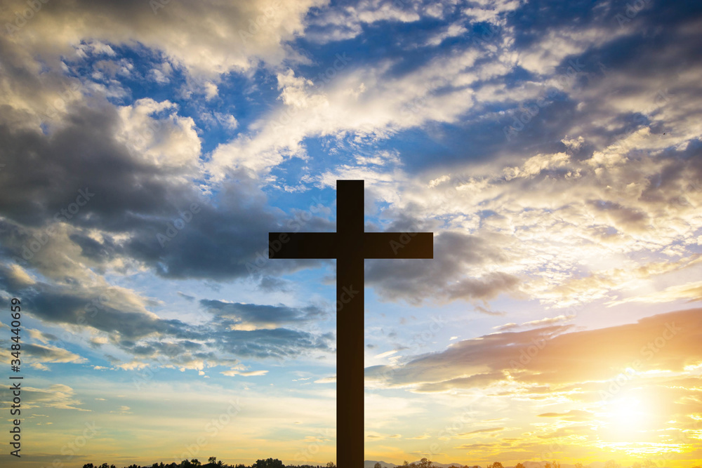 The Cross at the sunset background
