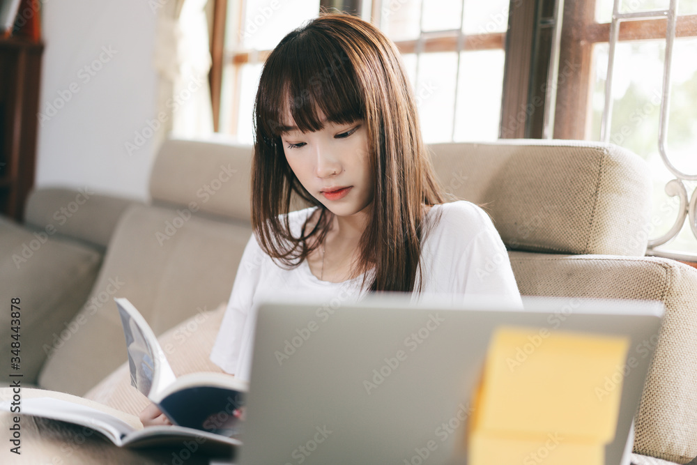 Asian happy smile teenager woman study online and stay at home. Asian happy smile teenager woman study online and stay at home.