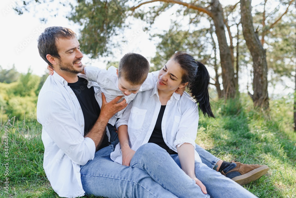 parents and child on vacation playing together outdoor parents and child on vacation playing together outdoor