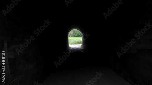 dark tunnel with light at the end