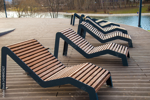 Sun loungers  on platform on lake