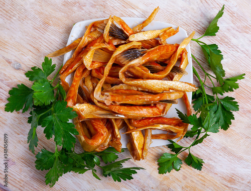 Smoked salmon bellies with greens