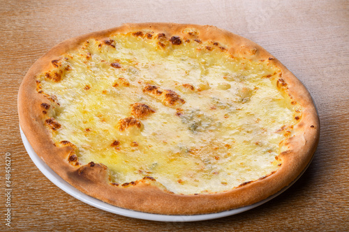 Quattro formaggi is a variety of Italian pizza topped with: mozzarella, gorgonzola, parmesan