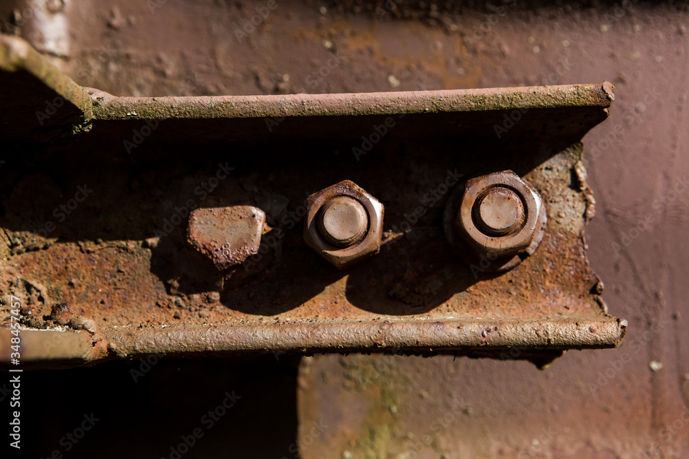 Old rusty metal door handle, old rusty bolts