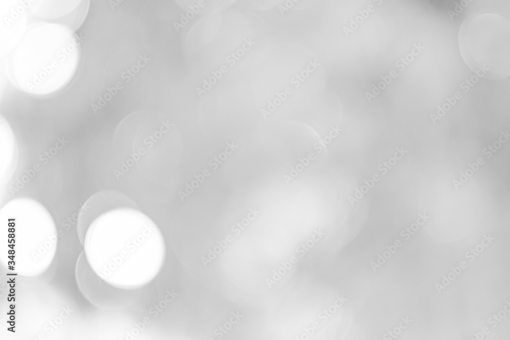 Obraz premium Szare białe jasne tło bokeh to lśniący, naturalnie szary cień, który nie jest wyraźny, ale piękny.